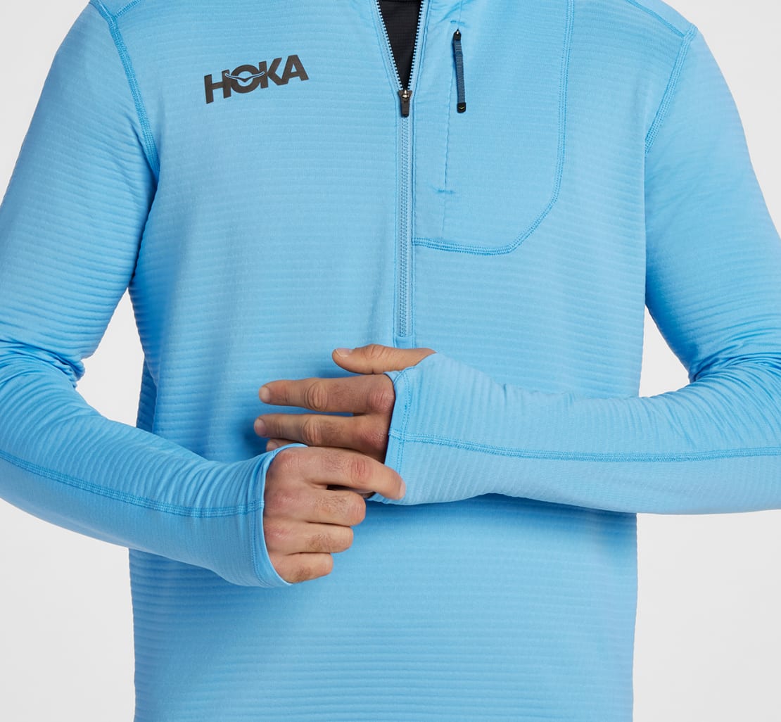 HOKA レディース ハーフジップ長袖トップス 青